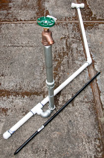 Mains water
                      pressure hose bib - prior to house pressure
                      regulator