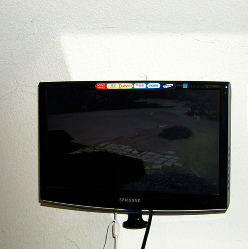 Samsung 933HD mounted
                    high on the wall