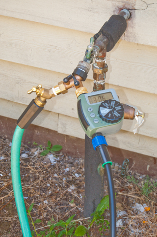 Using a second hose bib with a "Y" and
                  timer to solve the problem of someone turning off the
                  main hose bib which also turns off the timer.