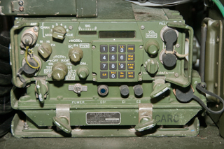 RT-1439 SINCGARS radio on MT-6567 Single Radio
                  Mount